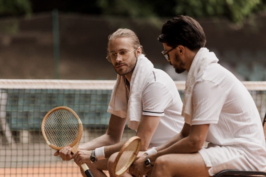 tennis players with towels