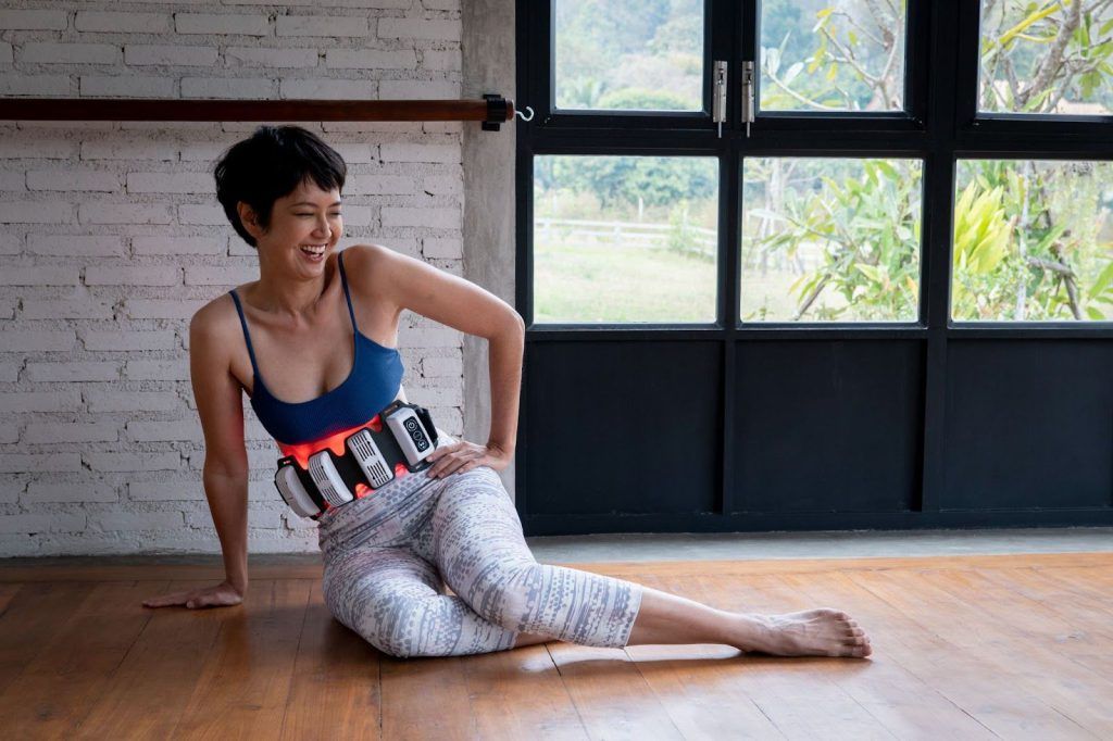 woman with flexbeam relaxing on the floor