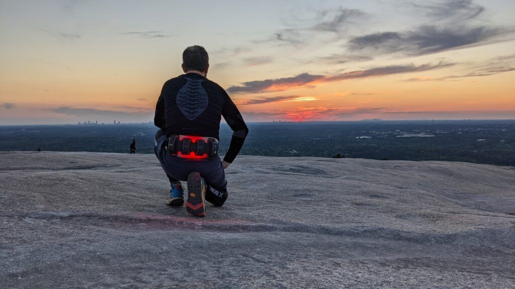 man wearing flexbeam while exercising outside